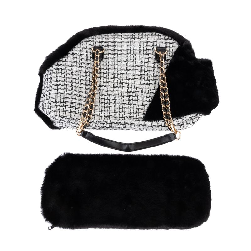 Black carrier bag with faux fur and gold chains, including removable faux fur cushion.