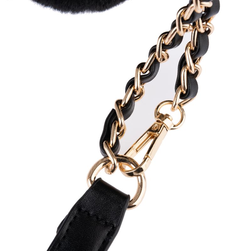 Close-up of a black leather necklace with gold-coloured metal links and a lobster clasp.