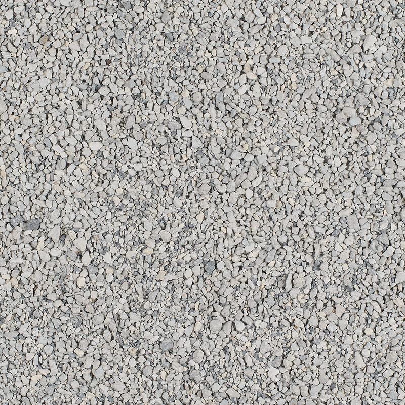 Close-up view of grey granulated material, showing texture and size of the product contents.