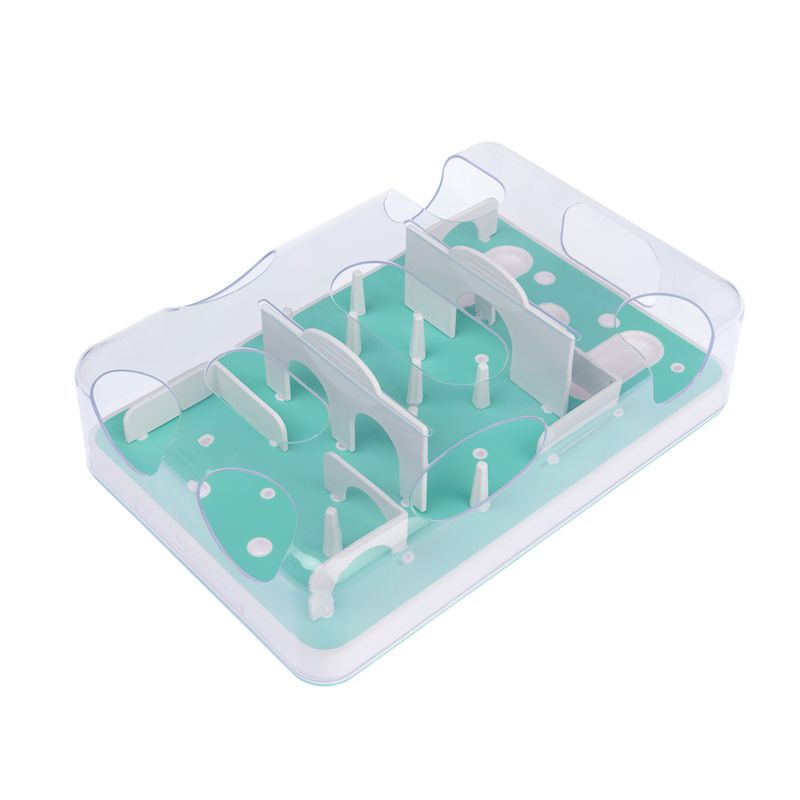 Interactive toy with green and white maze design and transparent walls, suitable for dexterity exercises.
