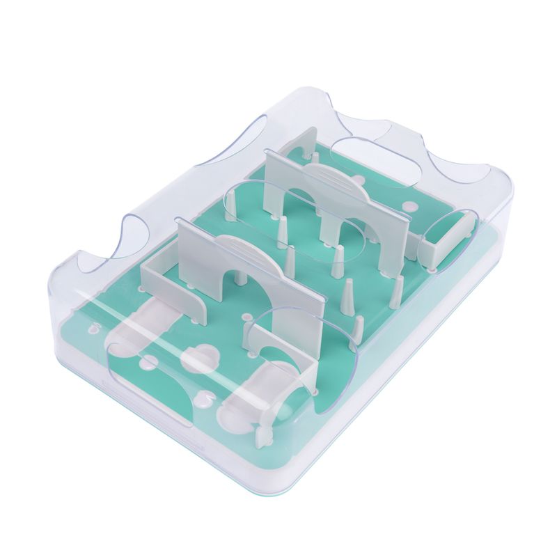 Interactive toy with green base and white obstacles, suitable for puzzle games and activity.