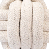Close-up of a braided rope made of cream-coloured cotton material, suitable for pet products or accessories.