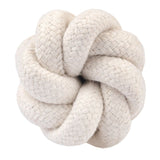 White knot ball made of braided cotton rope, suitable as toy or accessory.