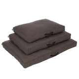 Dark brown rectangular dog cushions in three sizes, stackable with black handles on the side.