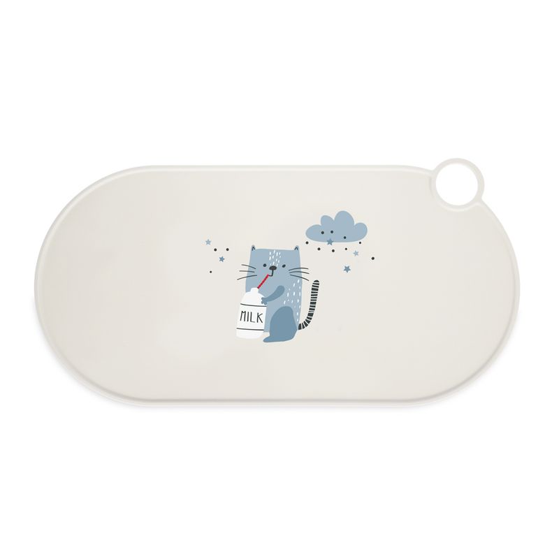 White oval mat with illustration of a grey cat drinking from a milk bottle. Stars and a cloud in the background.