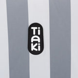 Tiaki logo on a grey and white striped background.