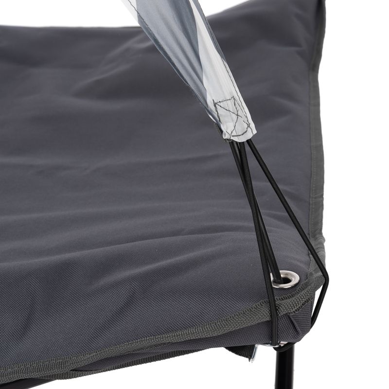 Close-up of a grey fabric cover with eyelets and elastic bands, attached to a metal frame.