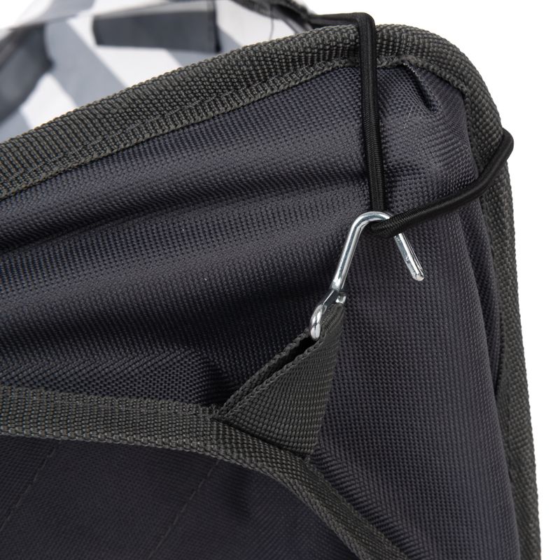 Close-up of black fabric material with metal hook and elastic band for fastening.