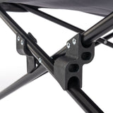 Close-up view of a sturdy metal frame with plastic connectors and screws, suitable for robust constructions.