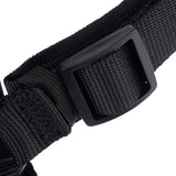 Close-up of a black strap with plastic buckle and woven material.