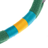 Toy rope made of green fabric with yellow and blue nylon sections.