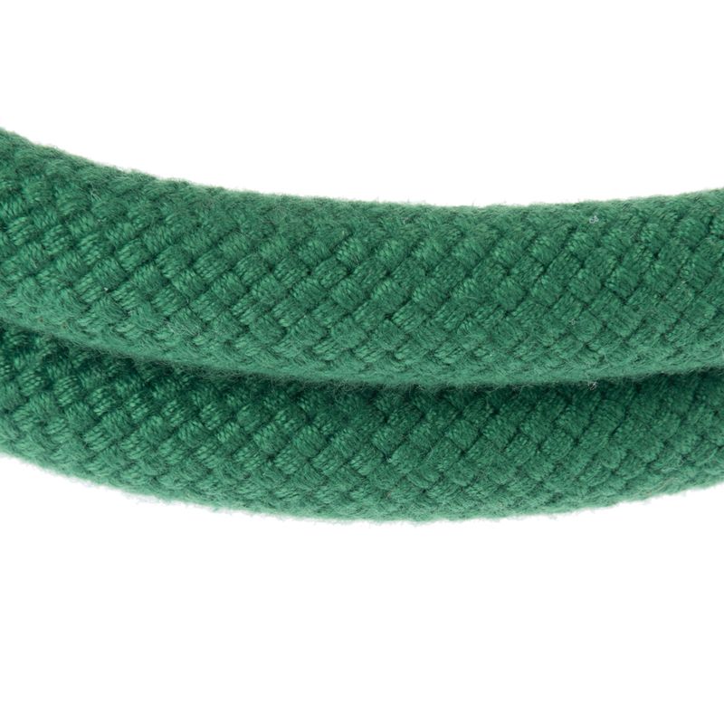 Green braided rope made of fabric material, close-up of the texture.