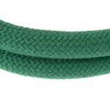 Green braided rope made of fabric material, close-up of the texture.