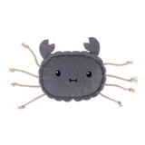 Grey fabric toy in the shape of a crab with rope arms and embroidered face.