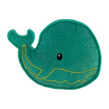 Green felt toy in the shape of a whale with embroidered details and a black eye.