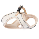Beige dog harness with reflective stripes, breathable material and click fastener. Suitable for secure hold and comfort.