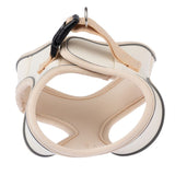 Beige dog harness with padded mesh fabric, adjustable strap and black click fastener. Metal ring for lead attachment visible.