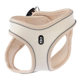 Tiaki beige dog harness with breathable mesh fabric and reflective strips, suitable for secure hold and comfort.