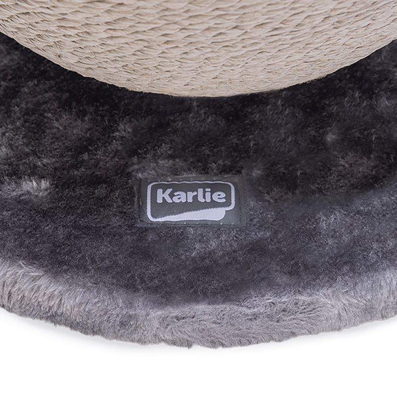 Karlie logo on grey, fluffy fabric base of a scratching post.