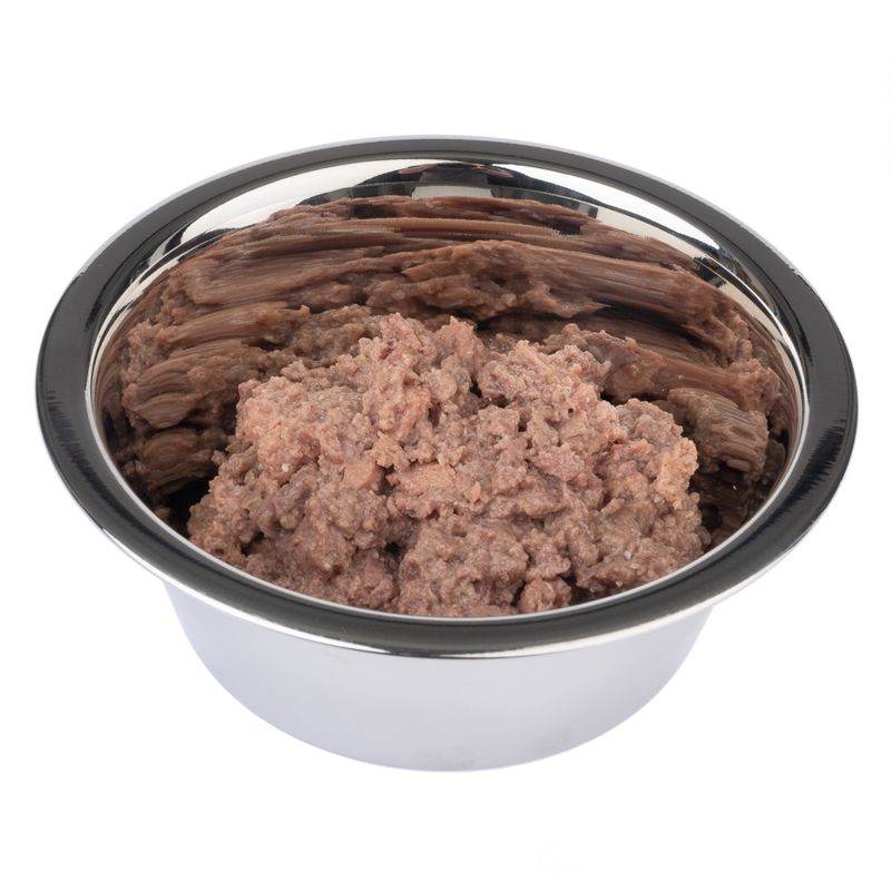 Close-up of wet food in a silver feeding bowl, brown and meaty texture visible.