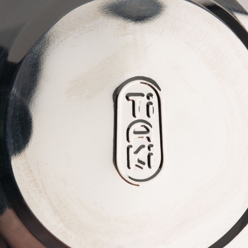 TiErKi logo on a shiny metal surface.