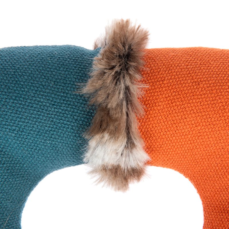 Toy made of knitted fabric in blue and orange with a brown, fluffy pendant.