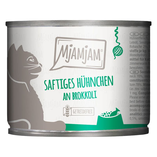 MjAMjAM Juicy chicken with broccoli, grain-free. Cat food in can with visible ingredients list and nutritional information.