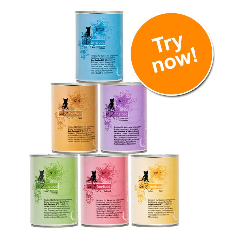 Six tins of cat finefood in assorted colours and flavours with a large orange circle displaying the text 'Try now!'