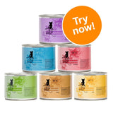 Six tins of catz finefood wet cat food, varieties N° 11, N° 13, N° 3, N° 5, N° 9, N° 7. Large orange badge with white text: Try now!