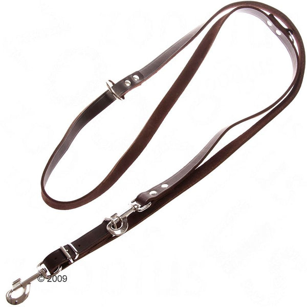Adjustable brown leather lead with metal clips and rings, showing multiple attachment points for length adjustment.