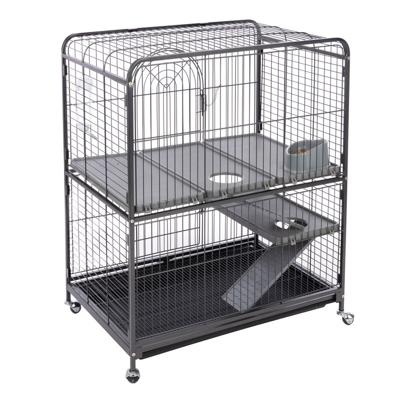 Metal cage with two levels, ramps, feeding station and wheels for easy movement. Suitable for small animals.