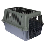 Transport box made of plastic with metal grid door, grey base and green lid, ventilation slots on the sides and carrying handle on top.