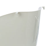 Close-up view of a white plastic container with hook and wire attachment on the side.