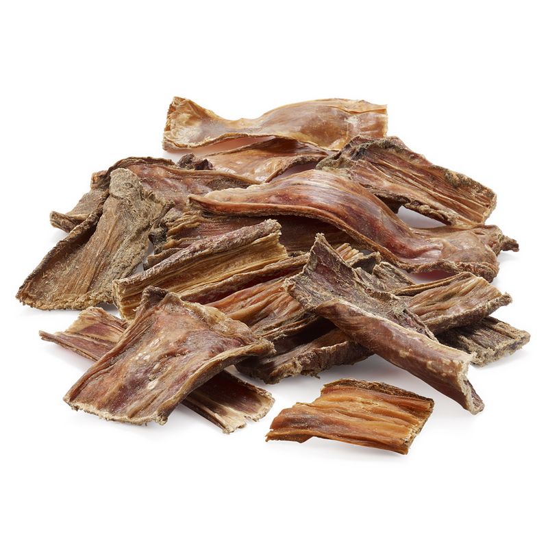 Pile of dried meat strips displayed on a white background, showing the product’s texture and size for treat or snack use.