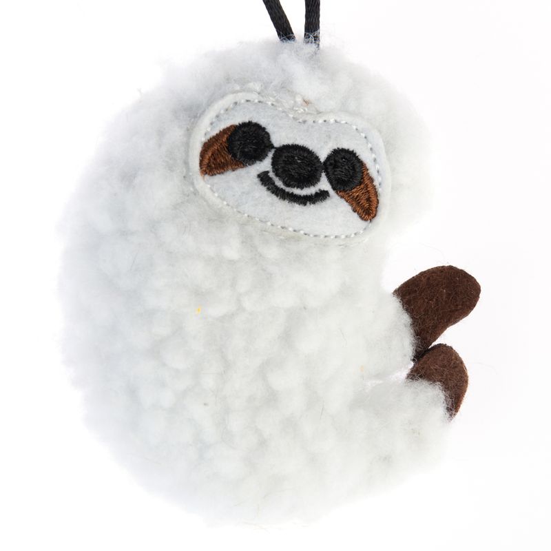 Plush toy in sloth shape with white fur and brown felt feet, suitable for playing or cuddling.