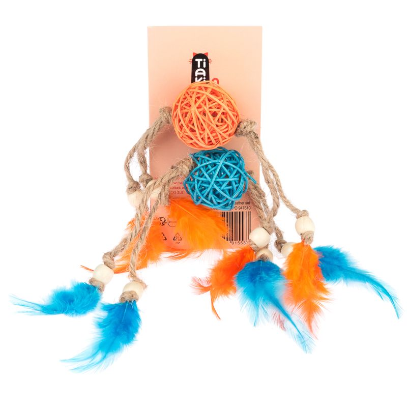 Toy with two braided balls in orange and blue, attached to ropes with wooden beads and colourful feathers in blue and orange. Packaging shows brand TIAKI.
