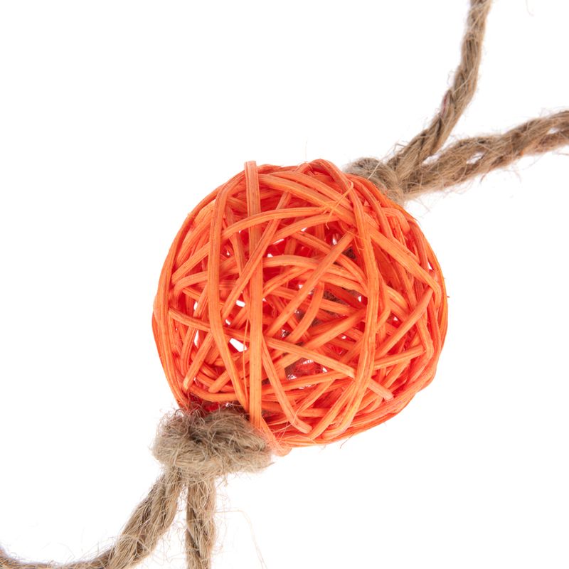 Toy made of orange plastic mesh, attached to a natural fibre rope.