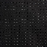 Close-up of black fabric with non-slip dots for better grip.