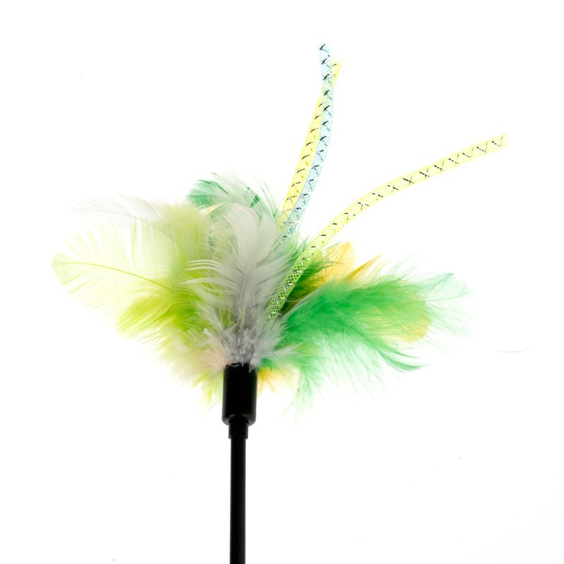 Toy with green, yellow and white feathers and decorative ribbons on a black rod.