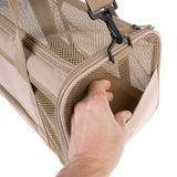 Beige transport bag with mesh fabric, zip and carrying strap. Hand reaches into side opening.