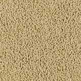 Close-up of small, beige pellets. Product description for pet food or bedding.
