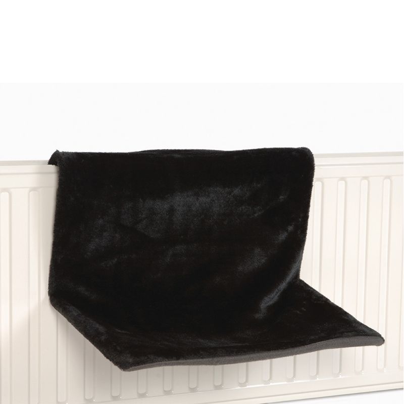 Black radiator bed made of soft fabric, attached to a white radiator. Suitable as a lying surface for warmth and comfort.