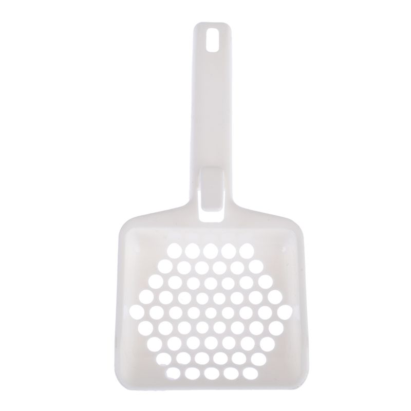 White plastic litter scoop with round holes for cleaning cat litter.