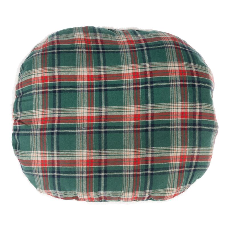 Round cushion with green-red check pattern, soft padding visible.