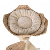 Cat tree with woven basket and soft beige cushion. Suitable for pets to relax or sleep.
