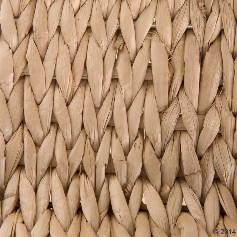 Close-up of a woven natural material, possibly raffia or straw.
