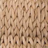 Close-up of a woven natural material, possibly raffia or straw.
