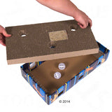Cardboard play box with removable top, holes and catnip. Inside are two white play balls. Hands demonstrate use of the box.