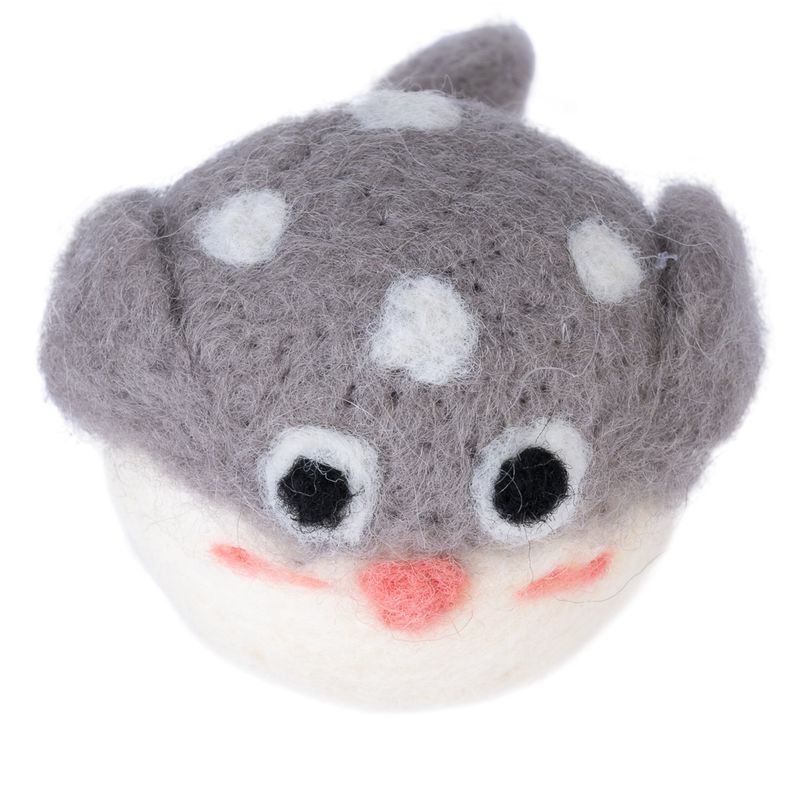 Felt toy in the shape of a grey fish with white dots, large eyes and pink details.