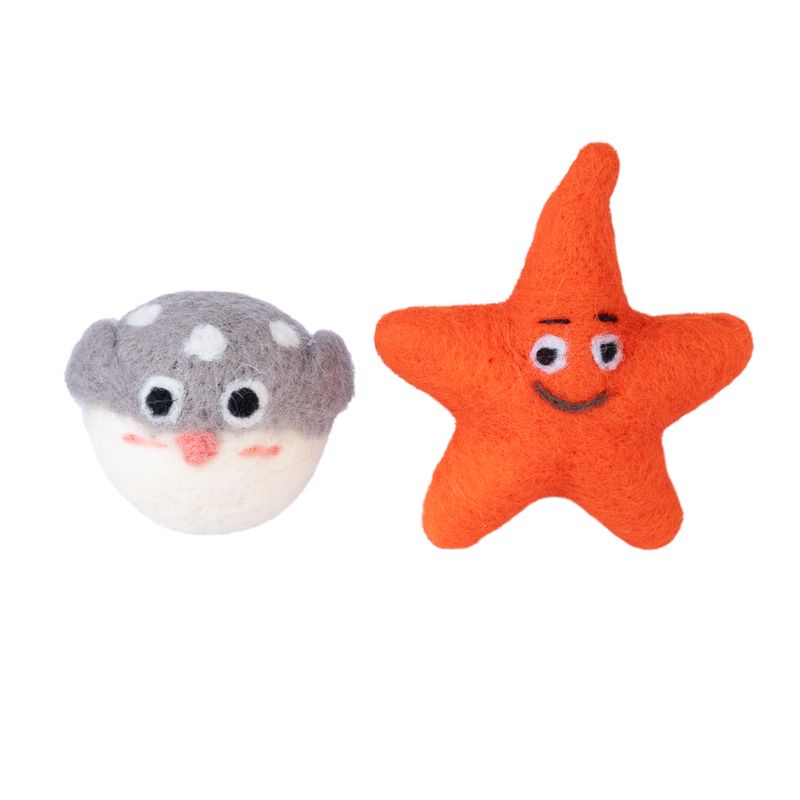 Two felt toys: a grey pufferfish with white spots and an orange starfish with a face. Suitable for pet play.